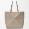 Medium horizontal Puzzle Fold tote in soft grained calfskin Clay Medium horizontal Puzzle Fold tote in soft grained calfskin Clay