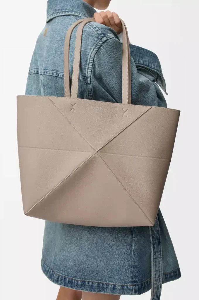 Medium horizontal Puzzle Fold tote in soft grained calfskin Clay Medium horizontal Puzzle Fold tote in soft grained calfskin Clay