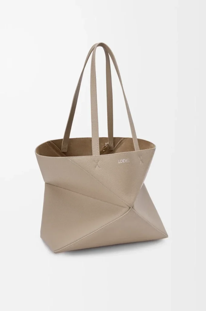 Medium horizontal Puzzle Fold tote in soft grained calfskin Clay Medium horizontal Puzzle Fold tote in soft grained calfskin Clay