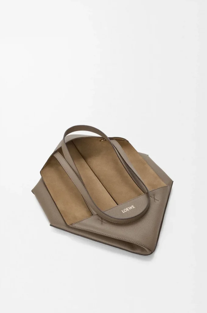 Medium horizontal Puzzle Fold tote in soft grained calfskin Taupe Medium horizontal Puzzle Fold tote in soft grained calfskin Taupe