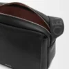 Medium Pebble messenger bag in supple grained calfskin Black