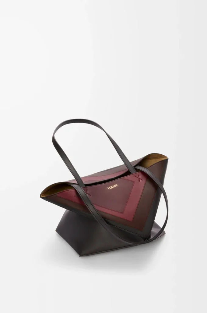 Medium Puzzle Fold tote in nappa calfskin Black/Burgundy Medium Puzzle Fold tote in nappa calfskin Black/Burgundy