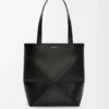 Medium Puzzle Fold tote in shiny calfskin Black Medium Puzzle Fold tote in shiny calfskin Black