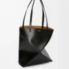 Medium Puzzle Fold tote in shiny calfskin Black Medium Puzzle Fold tote in shiny calfskin Black