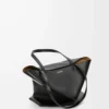 Medium Puzzle Fold tote in shiny calfskin Black Medium Puzzle Fold tote in shiny calfskin Black
