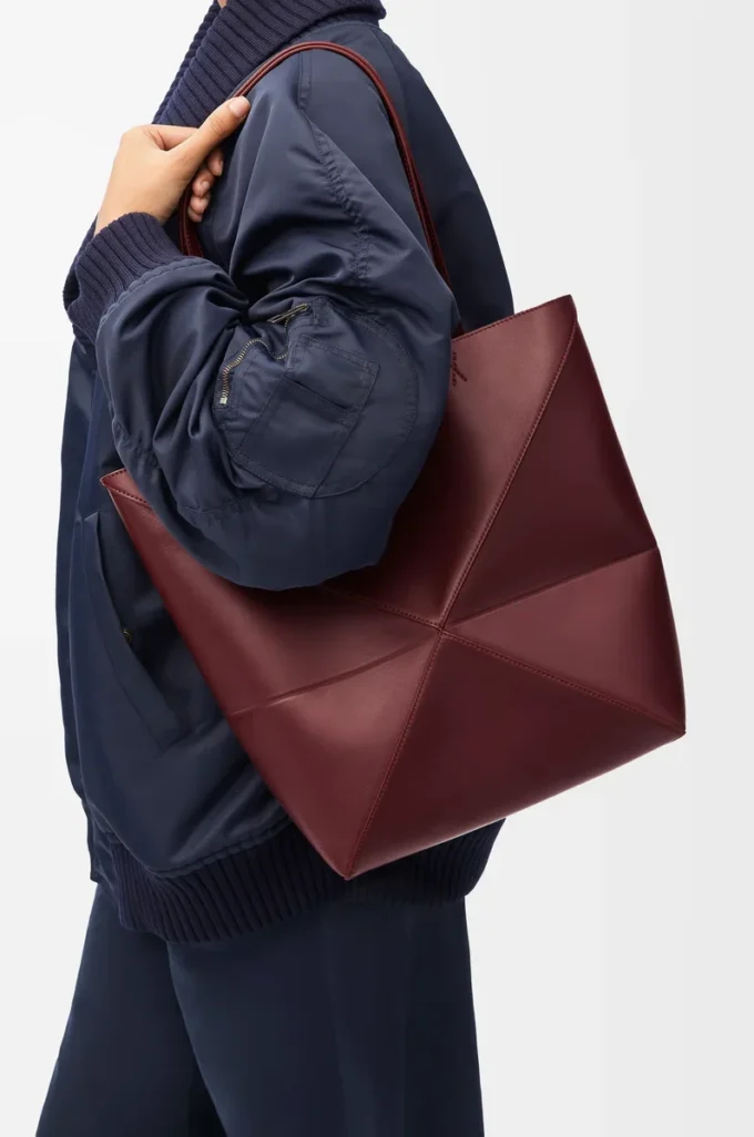 Medium Puzzle Fold tote in shiny calfskin Dark Burgundy Medium Puzzle Fold tote in shiny calfskin Dark Burgundy