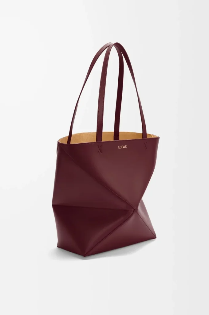 Medium Puzzle Fold tote in shiny calfskin Dark Burgundy Medium Puzzle Fold tote in shiny calfskin Dark Burgundy
