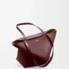 Medium Puzzle Fold tote in shiny calfskin Dark Burgundy Medium Puzzle Fold tote in shiny calfskin Dark Burgundy