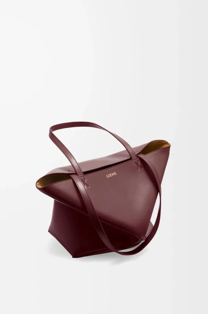 Medium Puzzle Fold tote in shiny calfskin Dark Burgundy Medium Puzzle Fold tote in shiny calfskin Dark Burgundy