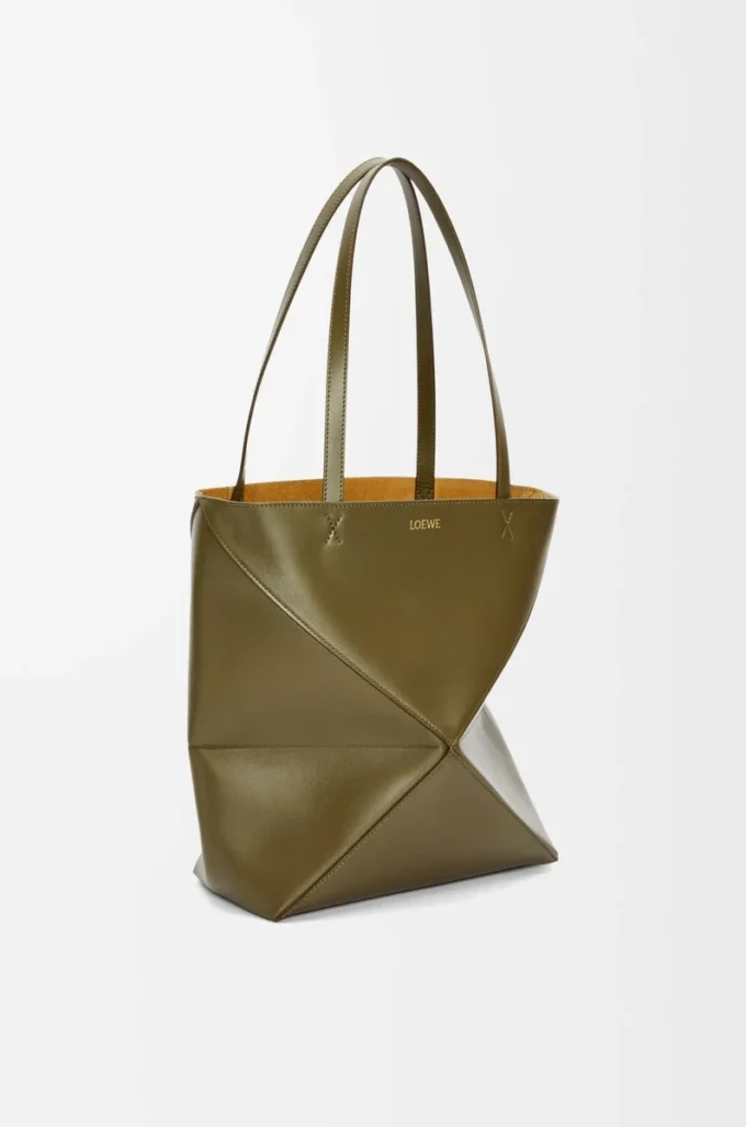 Medium Puzzle Fold tote in shiny calfskin Dark Khaki Medium Puzzle Fold tote in shiny calfskin Dark Khaki