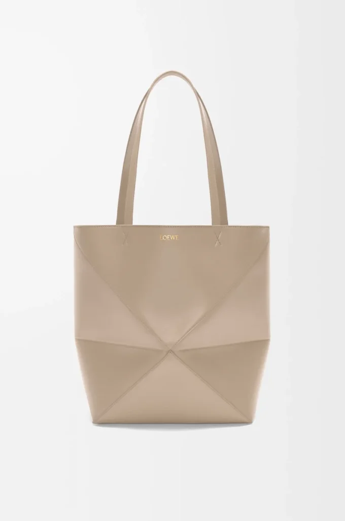 Medium Puzzle Fold tote in shiny calfskin Sand Medium Puzzle Fold tote in shiny calfskin Sand