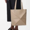 Medium Puzzle Fold tote in shiny calfskin Sand Medium Puzzle Fold tote in shiny calfskin Sand