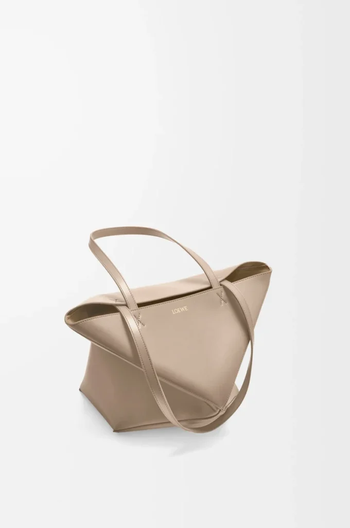 Medium Puzzle Fold tote in shiny calfskin Sand Medium Puzzle Fold tote in shiny calfskin Sand