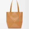 Medium Puzzle Fold tote in shiny calfskin Warm Desert Medium Puzzle Fold tote in shiny calfskin Warm Desert