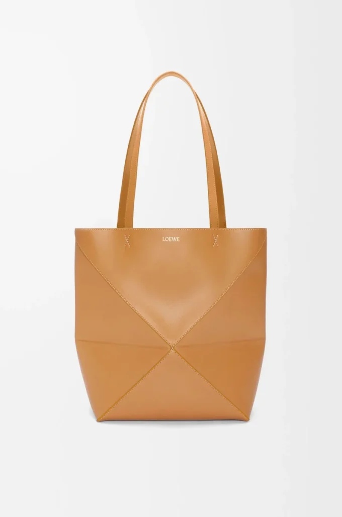 Medium Puzzle Fold tote in shiny calfskin Warm Desert Medium Puzzle Fold tote in shiny calfskin Warm Desert