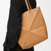 Medium Puzzle Fold tote in shiny calfskin Warm Desert Medium Puzzle Fold tote in shiny calfskin Warm Desert