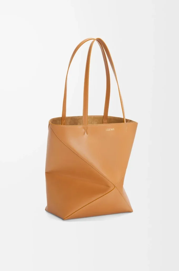 Medium Puzzle Fold tote in shiny calfskin Warm Desert Medium Puzzle Fold tote in shiny calfskin Warm Desert