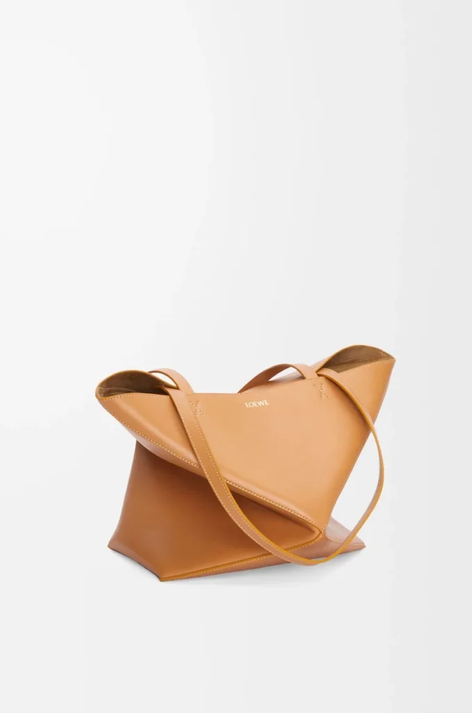 Medium Puzzle Fold tote in shiny calfskin Warm Desert Medium Puzzle Fold tote in shiny calfskin Warm Desert