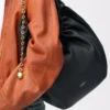 Medium Squeeze bag in mellow nappa lambskin Black Medium Squeeze bag in mellow nappa lambskin Black