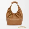 Medium Squeeze bag in mellow nappa lambskin Oak Medium Squeeze bag in mellow nappa lambskin Oak