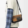 Mini Flex messenger in canvas and suede Black/Dark Gold Mini Flex messenger in canvas and suede Black/Dark Gold