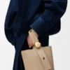 Mini Pebble Bucket bag in soft grained calfskin Sand