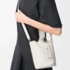 Mini Pebble Bucket bag in soft grained calfskin Soft White