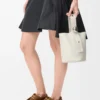 Mini Pebble Bucket bag in soft grained calfskin Soft White