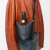 Mini Pebble bucket in smooth calfskin Black