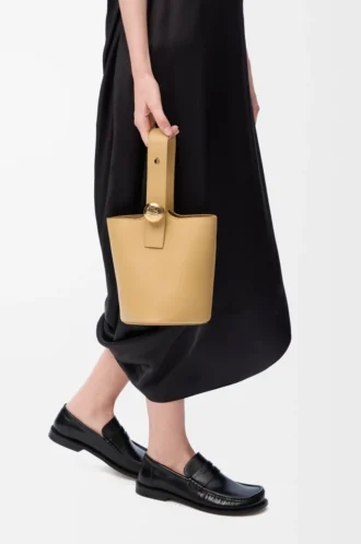 Mini Pebble bucket in smooth calfskin Dark Butter
