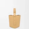 Mini Pebble bucket in smooth calfskin Dark Butter