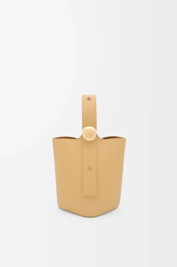 Mini Pebble bucket in smooth calfskin Dark Butter