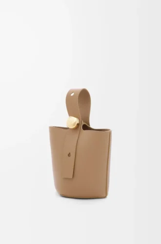 Mini Pebble bucket in soft grained calfskin Latte