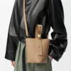 Mini Pebble bucket in soft grained calfskin Latte