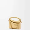 Mini Puzzle Edge bag in laminated lambskin Gold Mini Puzzle Edge bag in laminated lambskin Gold