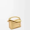 Mini Puzzle Edge bag in laminated lambskin Gold Mini Puzzle Edge bag in laminated lambskin Gold