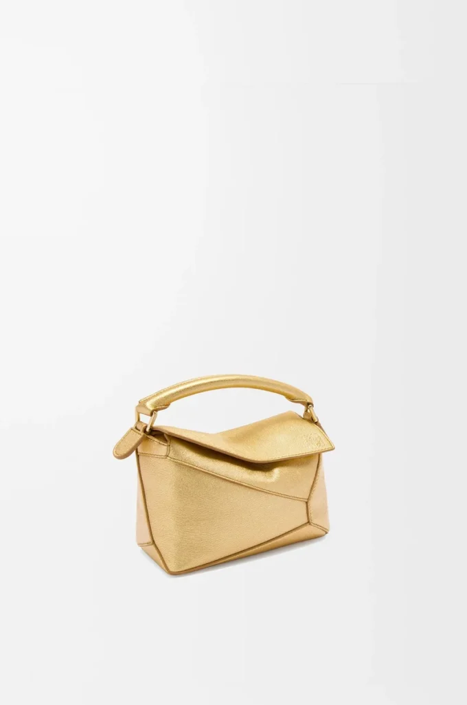 Mini Puzzle Edge bag in laminated lambskin Gold Mini Puzzle Edge bag in laminated lambskin Gold