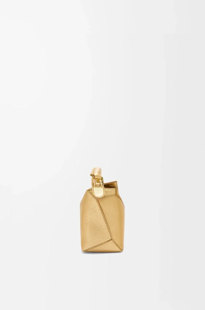 Mini Puzzle Edge bag in laminated lambskin Gold Mini Puzzle Edge bag in laminated lambskin Gold