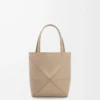 Mini Puzzle Fold tote in shiny calfskin Sand Mini Puzzle Fold tote in shiny calfskin Sand