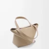 Mini Puzzle Fold tote in shiny calfskin Sand Mini Puzzle Fold tote in shiny calfskin Sand