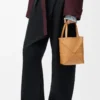 Mini Puzzle Fold tote in shiny calfskin Warm Desert Mini Puzzle Fold tote in shiny calfskin Warm Desert