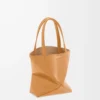 Mini Puzzle Fold tote in shiny calfskin Warm Desert Mini Puzzle Fold tote in shiny calfskin Warm Desert