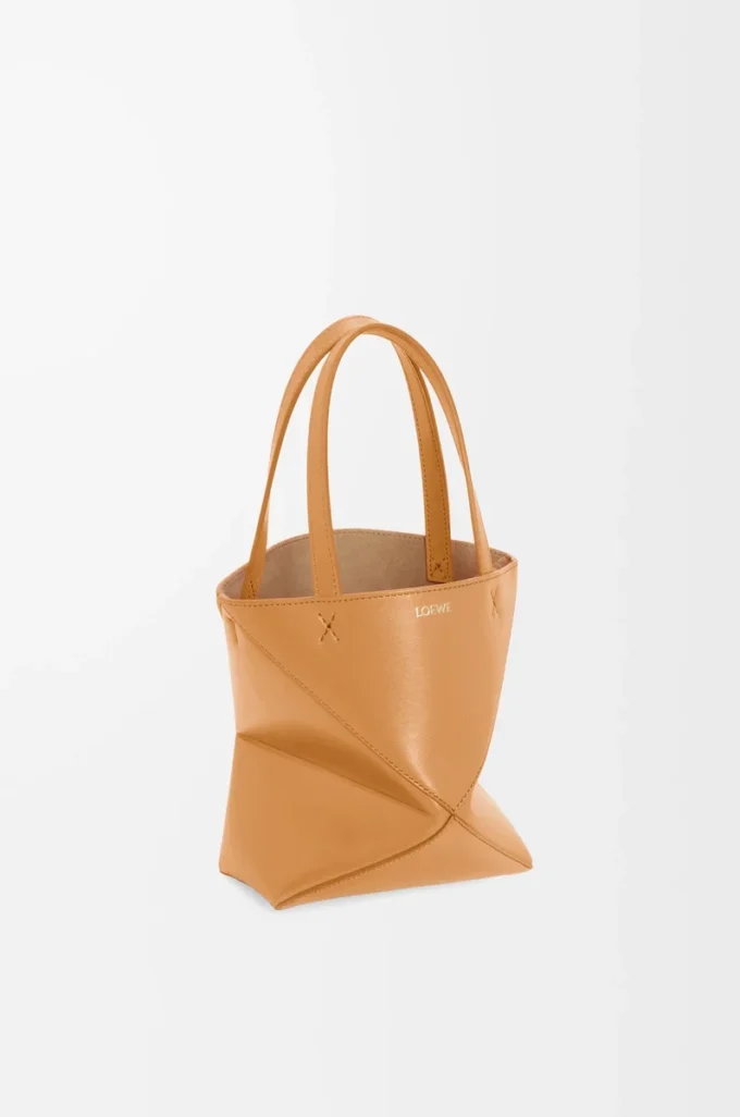 Mini Puzzle Fold tote in shiny calfskin Warm Desert Mini Puzzle Fold tote in shiny calfskin Warm Desert