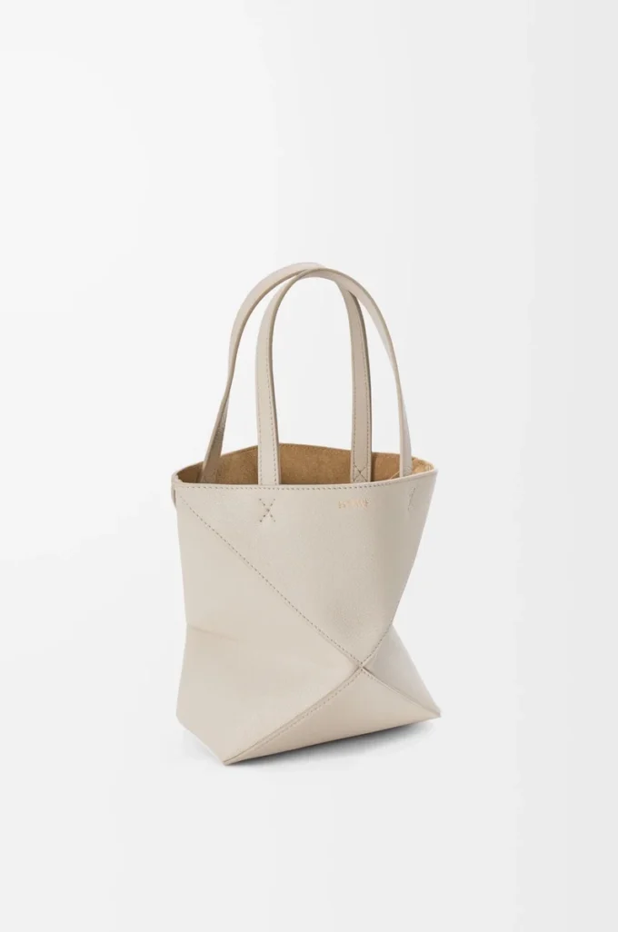 Mini Puzzle Fold tote in soft grained calfskin Light Ghost Mini Puzzle Fold tote in soft grained calfskin Light Ghost