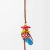 Parrot Puzz charm Tan/Red Parrot Puzz charm Tan/Red