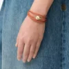 Pebble bracelet in calfskin Orange/Gold Pebble bracelet in calfskin Orange/Gold