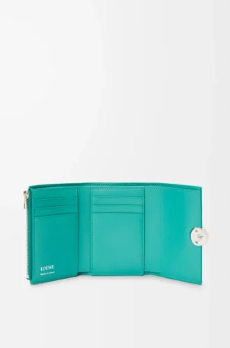 Pebble small vertical wallet in pebble grained calfskin Aquamarine