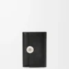 Pebble small vertical wallet in pebble grained calfskin Black Pebble small vertical wallet in pebble grained calfskin Black