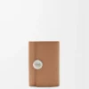 Pebble small vertical wallet in pebble grained calfskin Mocha Pebble small vertical wallet in pebble grained calfskin Mocha
