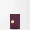 Pebble small vertical wallet in pebble grained calfskin Plum Pebble small vertical wallet in pebble grained calfskin Plum